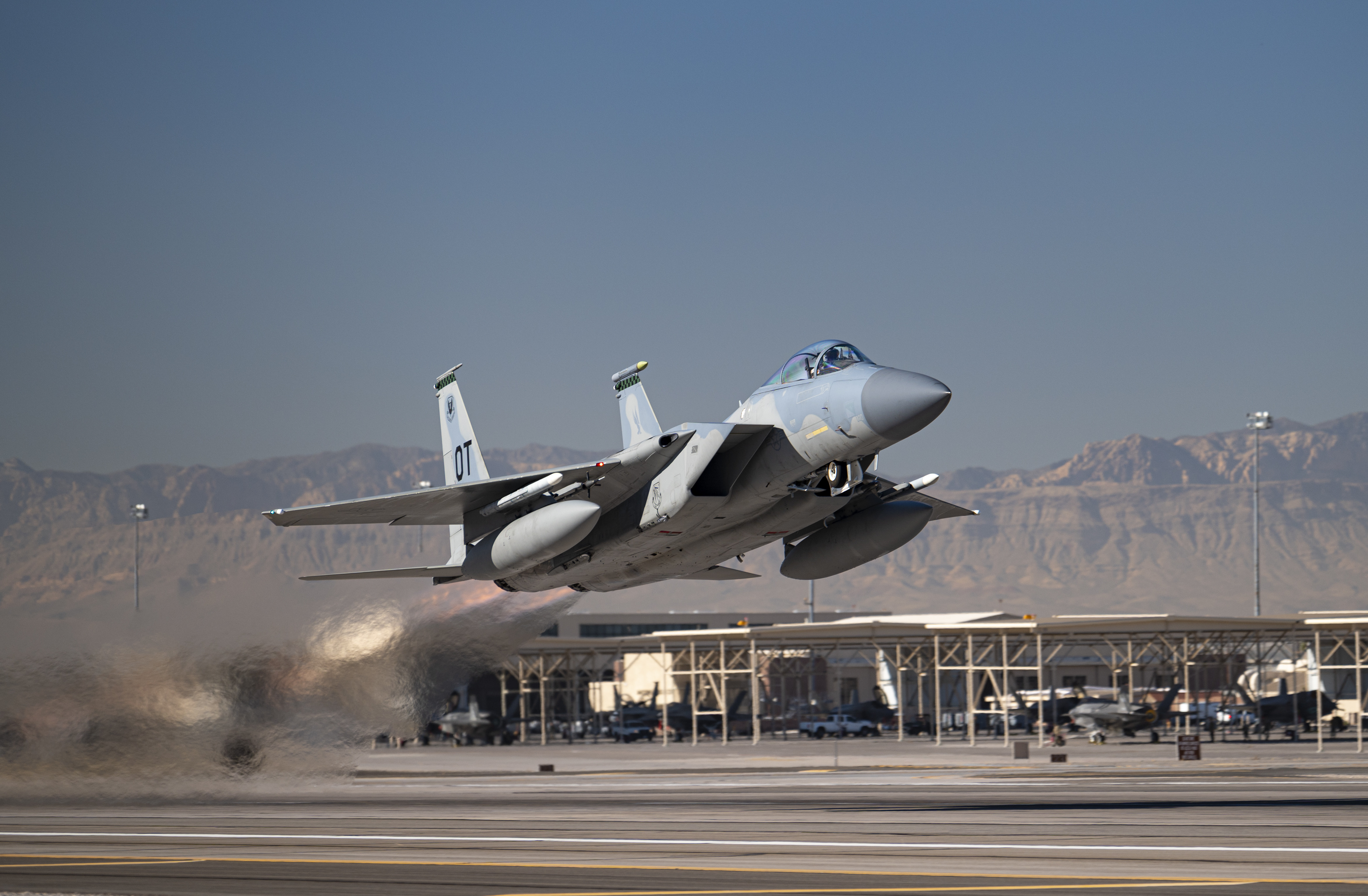 An F-15C Eagle takes off to conduct its final defensive counter air vul during Weapons School Integration 21-B at Nellis Air Force Base, Nevada, Dec. 8, 2021. As the Air Force continues to modernize, this class marks the final F-15C Weapons Instructor Course to be taught at the United States Air Force Weapons School.