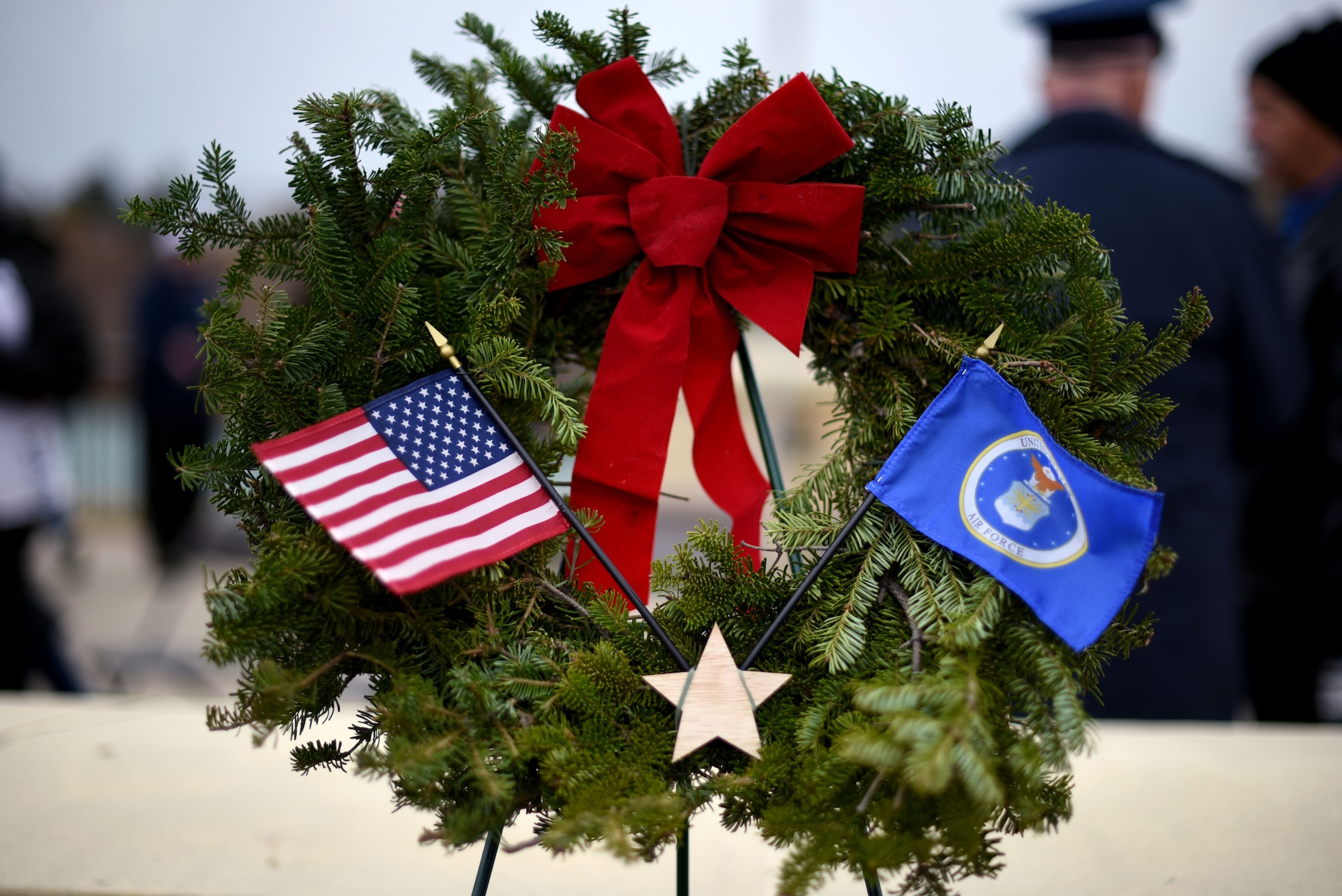 The U.S. Air Force wreath represents deceased Airmen during a Wreaths Across America event at the Dallas-Fort Worth National Cemetery on Dec. 18, 2021. Airmen from the 301st Fighter Wing remembered their fellow service members by distributing and laying wreaths. (U.S. Air Force photo by Staff Sgt. Randall Moose)