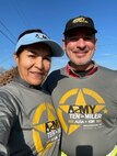 Dr. Raymond Vazquez is pictured with his wife, Teresa. Vazquez credits his wife for pushing him to keep the tradition of participating in the annual Army Ten-Miler going for the past seven years. (U.S. Army photo courtesy Dr. Raymond Vazquez)