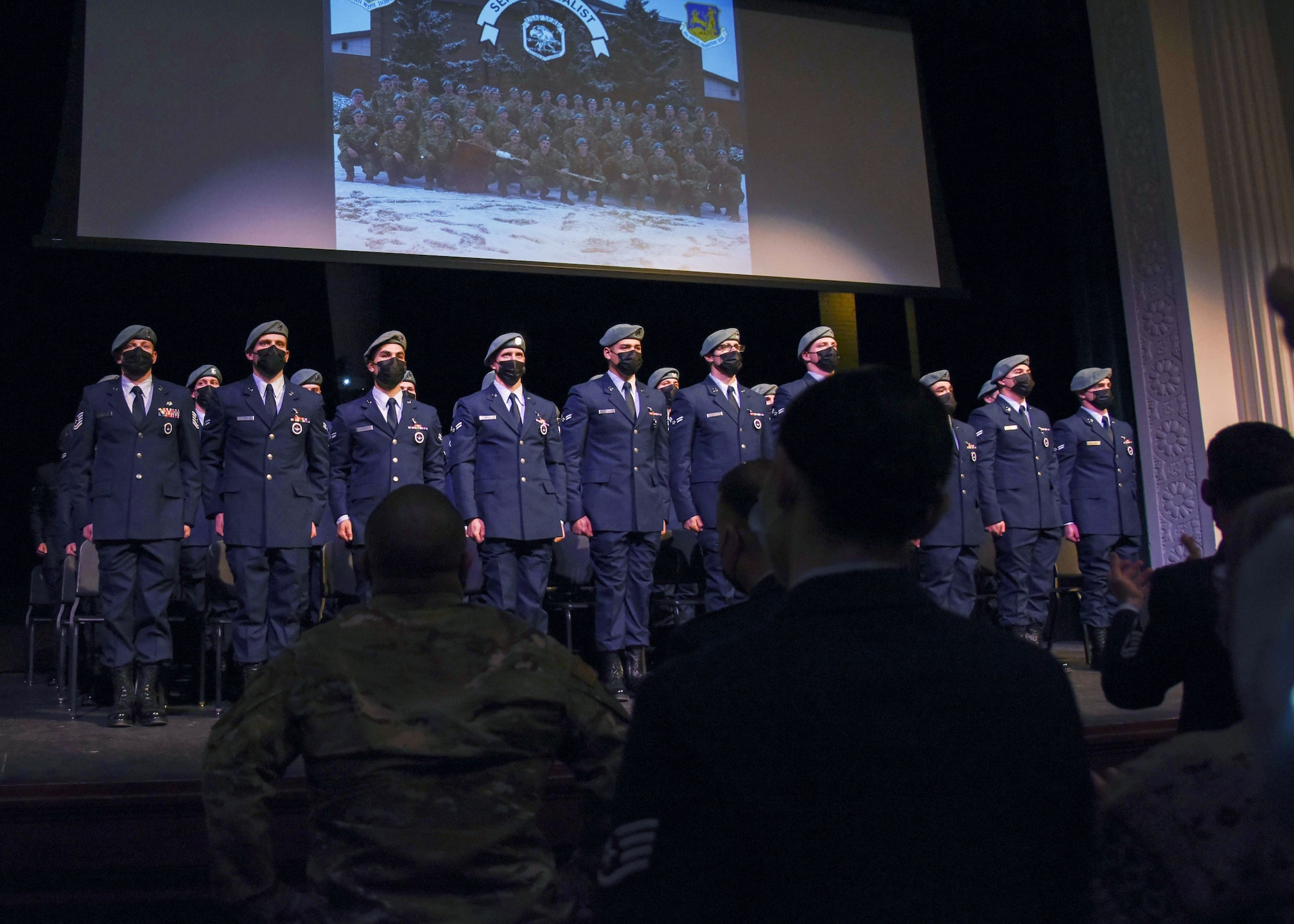 U.S. Air Force Survival Evasion Resistance Escape School Airmen graduate as SERE specialists, in Spokane, Washington Dec. 17, 2021. The 336th Training Group held a graduation ceremony for its largest SERE Specialist Apprentice Course with an all-time high of 44 graduates. (U.S. Air Force photo by Airman 1st Class Anneliese Kaiser)