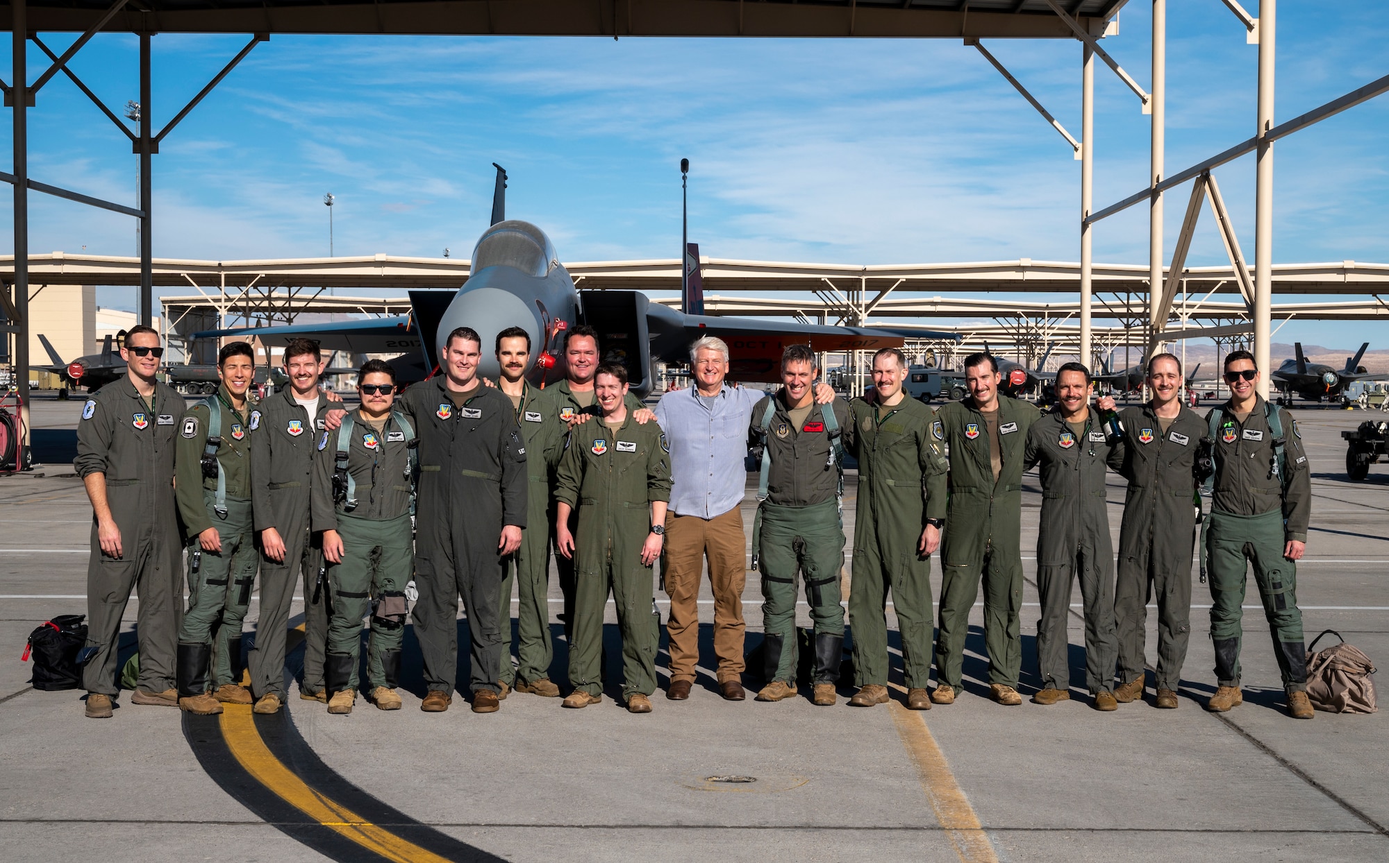 Group of pilots standing in front of F-15C