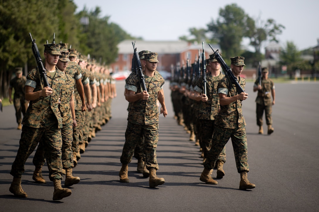 U.S. Marine Corps officer candidates with India Company participate in a close order drill competition at Officer Candidates School on Marine Corps Base Quantico, Va., Aug. 9, 2021. Close order drill instills discipline by increasing precision, response to orders and confidence within the candidates.