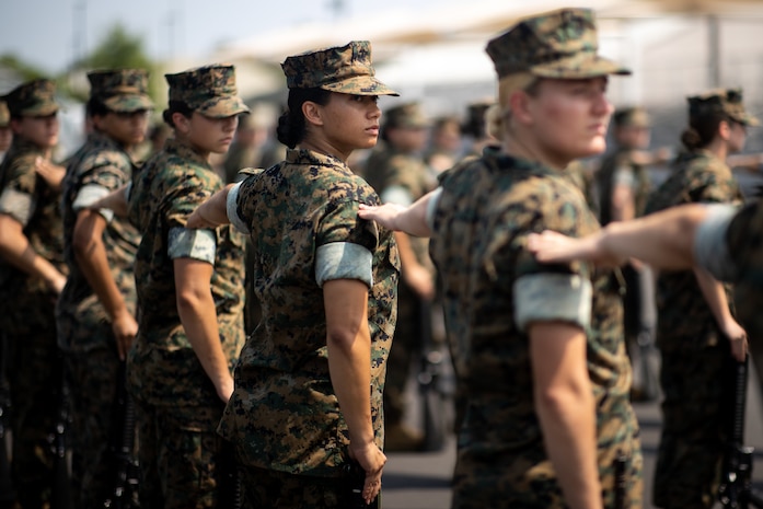 U.S. Marine Corps officer candidates with Lima Company participate in a close order drill competition at Officer Candidates School on Marine Corps Base Quantico, Va., Aug. 9, 2021. Close order drill instills discipline by increasing precision, response to orders and confidence within the candidates.