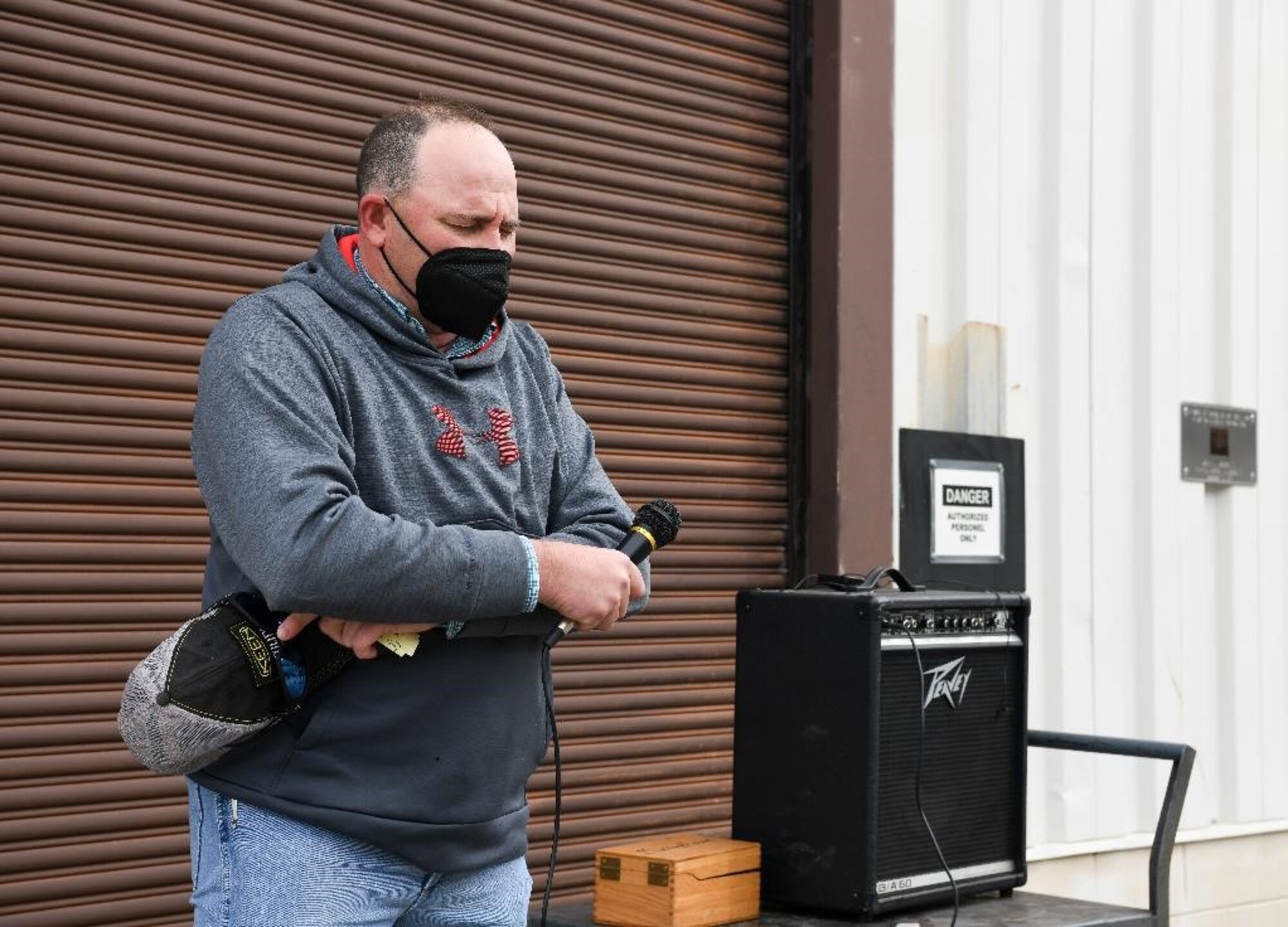 Kevin Glaser, chief steward for ironworkers at Arnold Air Force Base, Tenn., leads a prayer during a memorial held in remembrance of John Hill and Alvin Overman who died 50 years ago working at Arnold Air Force Base, Tenn., Dec. 9, 2021. Hill and Overman died as a result of argon asphyxiation while working on an offline furnace. Lessons learned over the decades have improved workplace safety. (U.S. Air Force photo by Jill Pickett)