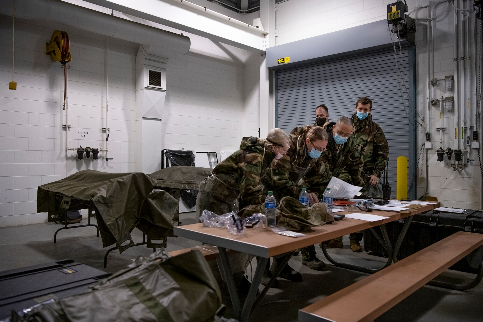 110th Force Support members fill out body identification markers for two simulated casualties at Battle Creek Air National Guard Base, Michigan, Oct. 23, 2021, while performing Mortuary Affairs duties during the 110th Wing’s Air Combat Command Midpoint Inspection.



Air Force Mortuary Affairs Operations seek to provide dignity, honor, and respect to the fallen and care service and support to their families. (U.S. Air National Guard photo by Staff Sgt. Jacob Cessna)