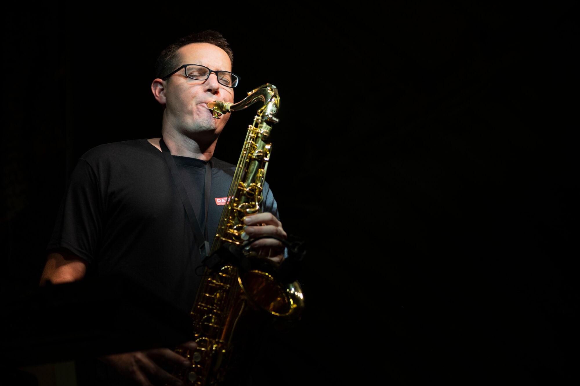 Playing saxophone