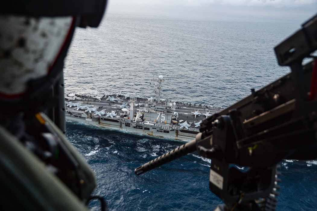 The Nimitz-class aircraft carrier USS Harry S. Truman (CVN 75), transits the Strait of Gibraltar, Dec. 14, 2021.