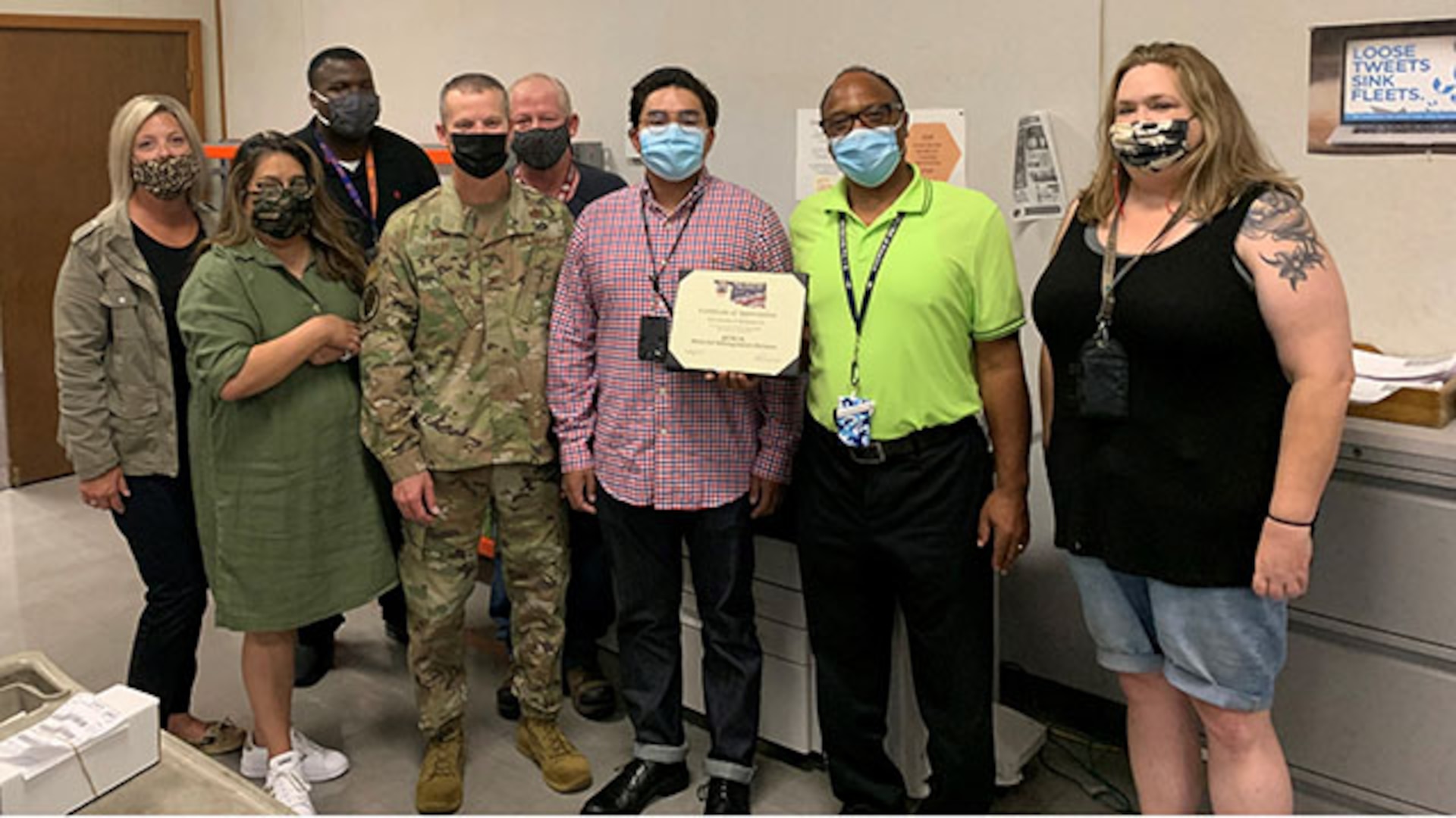 Air Force Col. Jason Kalin recognizes employees in the  MII  Shop Service Center Sept. 16, 2021.