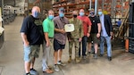 Air Force Col. Jason Kalin recognizes employees in the MDD Shop Service Center Sept. 16, 2021.