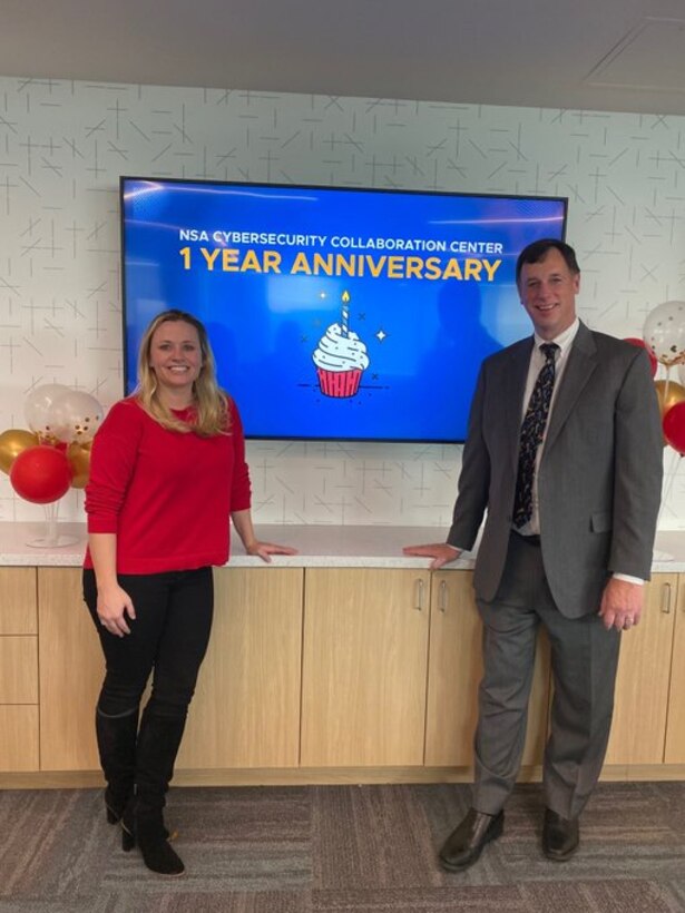 Rob Joyce, NSA Cybersecurity Director, and Morgan Adamski, Chief, NSA Cybersecurity Collaboration Center, celebrate the one-year anniversary of the center opening its doors.