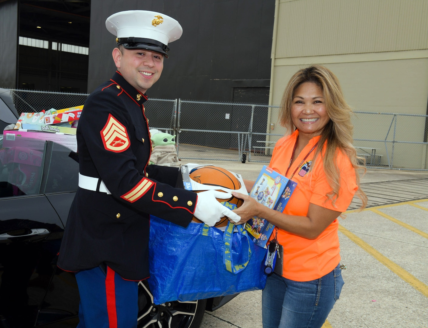 DLA aviation employees donate to Marine Corps Toys for Tots annual campaign.