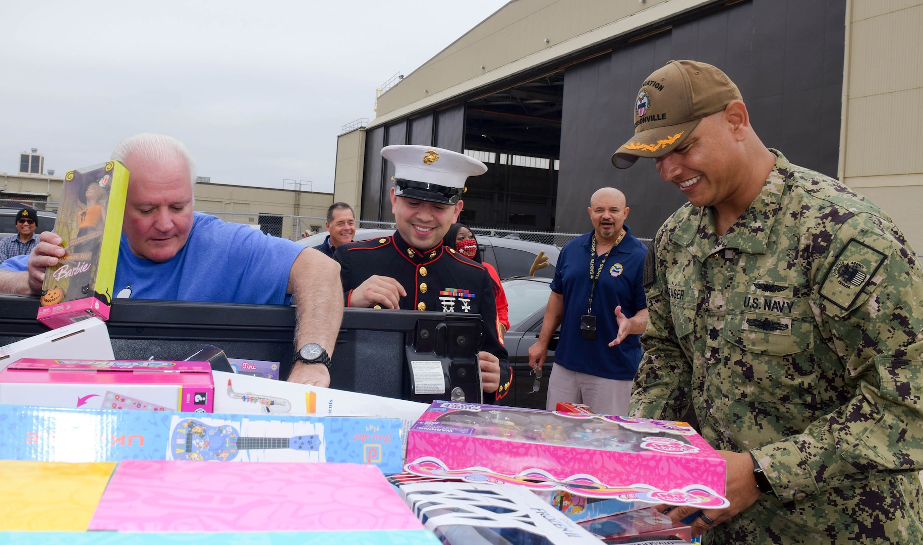 DLA aviation employees donate to Marine Corps Toys for Tots annual campaign.