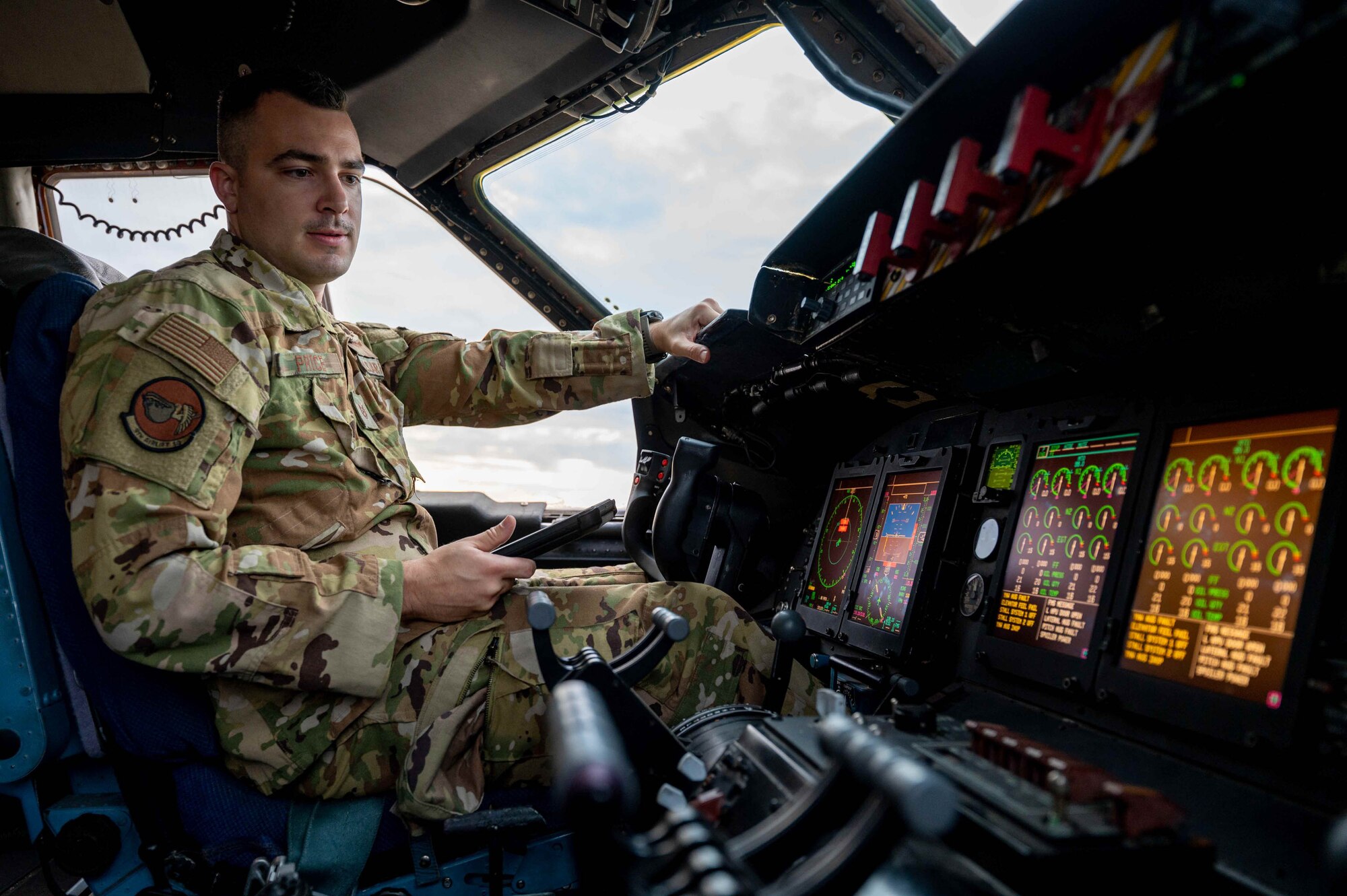 Tech. Sgt. Perry Price, 9th Airlift Squadron flight engineer, performs a pre-flight check on a C-5M Super Galaxy before takeoff to Joint Base McGuire-Dix-Lakehurst, New Jersey, at Dover Air Force Base, Delaware, Dec. 17, 2021. The 9th Airlift Squadron delivered supplies to aid the Joint Base Pearl Harbor-Hickam (JBPHH), Hawaii water quality recovery, a joint U.S. military initiative working closely with the State of Hawaii, Department of Health, Honolulu Board of Water Supply, U.S. government and independent organizations to restore a safe water delivery system to JBPHH military housing communities through testing, treatment, and repair. For detailed information, including available resources and locations, and news, go to www.navy.mil/jointbasewater. (U.S. Air Force photo by Senior Airman Faith Schaefer)