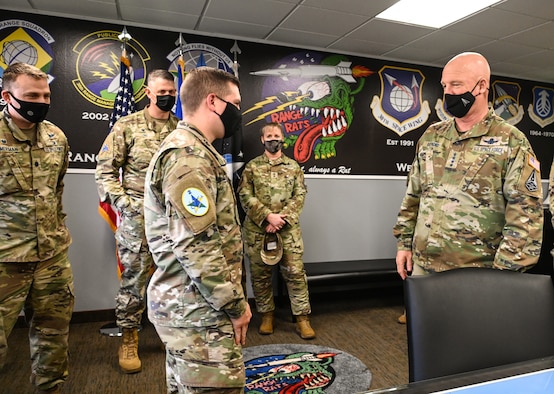 Chief of Space Operations Gen. John W. “Jay” Raymond and Chief Master Sergeant of the Space Force Roger A. Towberman, greet members of 2nd Range Operations Squadron at Vandenberg Space Force Base, Dec. 21, 2021. Raymond and Towberman visited VSFB as part of their “Thank you” tour this week. (U.S. Space Force photo by Airman 1st Class Rocio Romo)