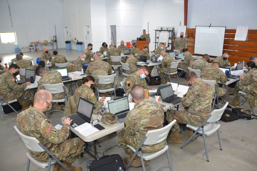 Pennsylvania Army National Guard Soldiers receive instruction during the Equal Opportunity Leaders Course Dec. 13, 2021, at Fort Indiantown Gap, Pa.