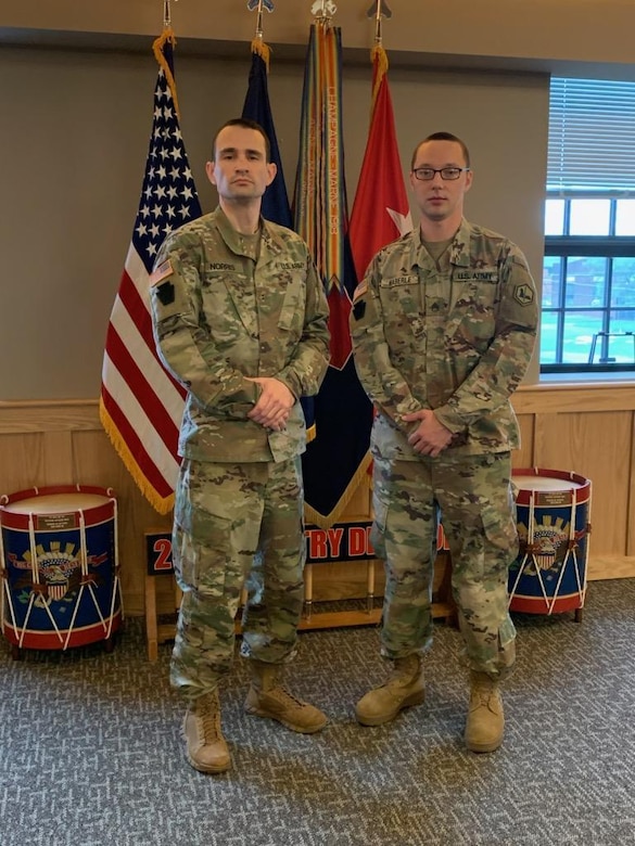 (Left to Right) Chief Warrant Officer 2 Zachery Norris, U.S. Army Europe and Africa’s Federated Intelligence Program Production Manager with the 66th Military Intelligence Brigade, and Staff Sgt. Matthew Haberle, USAREUR-AF FIP Mission Manager with the 66th MI, pose for a photo in Harrisburg, Pennsylvania. Haberle was recognized with the 2021’s recipient of the Colonel Carl F. Eifler National Guard award during the National Military Intelligence Foundation’s “Night of Heroes” virtual event on Nov. 17, 2021.