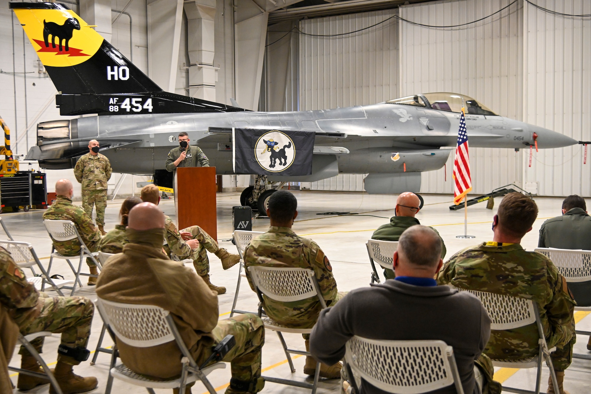 Col. Nicholas Pederson, 49th Wing vice commander, gives opening remarks during 8th Aircraft Maintenance Unit transition ceremony, Dec. 22, 2021, on Holloman Air Force Base, New Mexico. The 8th AMU will now be fully manned by over 200 active duty Airmen. (U.S. Air Force photo by Airman 1st Class Jessica Sanchez-Chen)