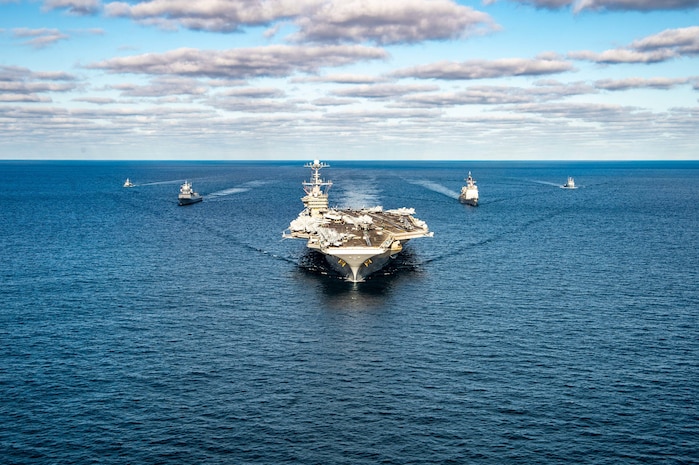 The Nimitz-class aircraft carrier USS Harry S. Truman (CVN 75), the Ticonderoga-class guided missile cruiser USS San Jacinto (CG 56), and the Royal Norwegian Navy Frigate HNoMS Fridtjof Nansen (F310) participate in a passing exercise with the Tunisian offshore patrol vessel Hannon (P612) and La Combatante III class fast patrol boat Tunis (502) in the Mediterranean Sea, Dec. 20, 2021.