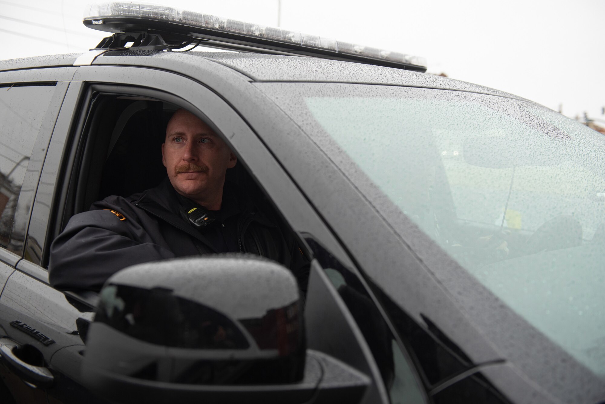 Master Sgt. J Shultz, first sergeant for the Kentucky Air National Guard’s 123rd Security Forces Squadron, conducts a presence patrol in Mayfield, Ky., Dec. 18, 2021. Shultz also serves as one of the city’s civilian police officers, a post he’s held for 11 years. (U.S. Air National Guard photo by Staff Sgt. Clayton Wear)