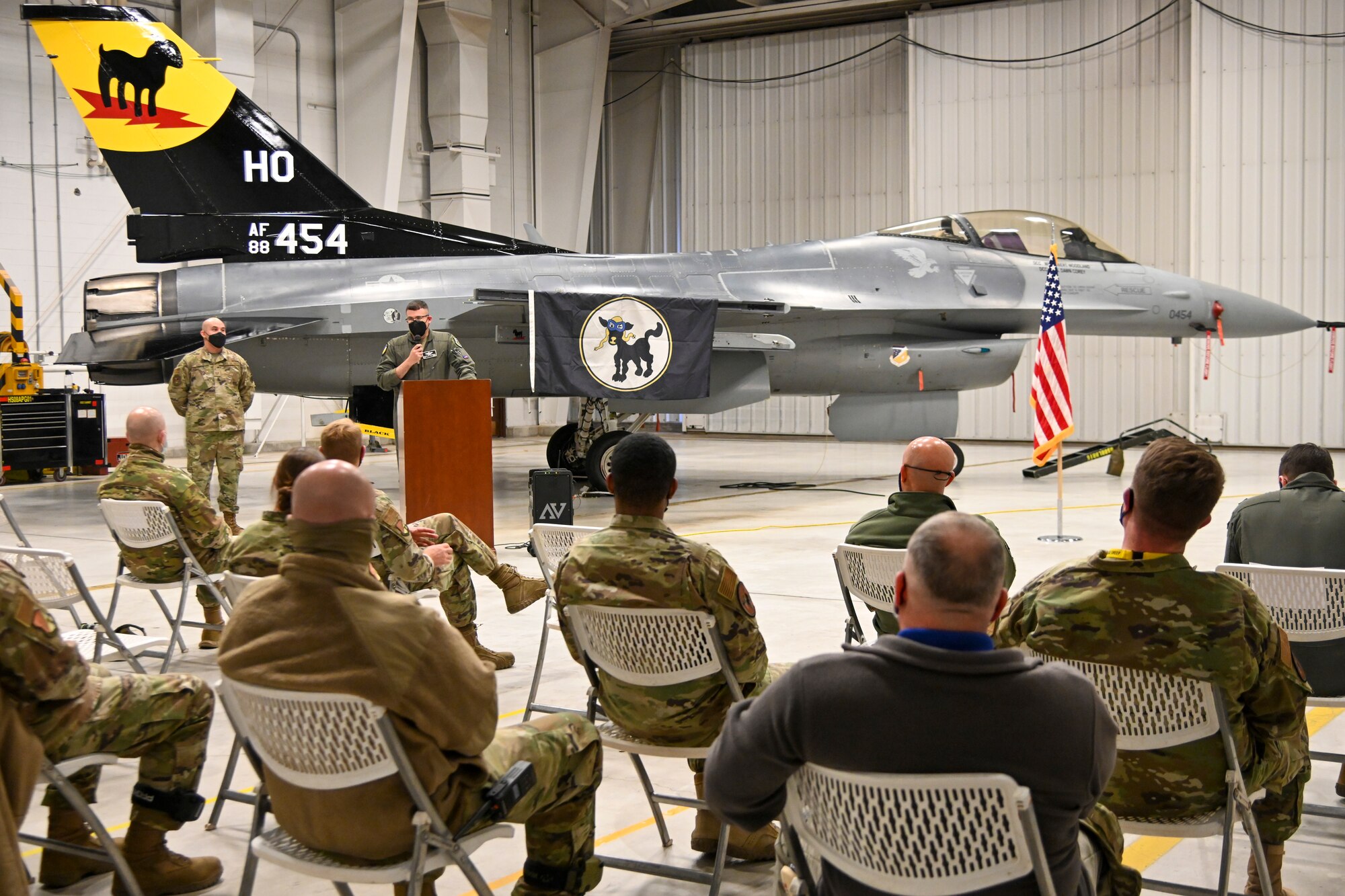 Col. Nicholas Pederson, 49th Wing vice commander, gives opening remarks during 8th Aircraft Maintenance Unit transition ceremony, Dec. 22, 2021, on Holloman Air Force Base, New Mexico. The 8th AMU will now be fully manned by over 200 active duty Airmen. (U.S. Air Force photo by Airman 1st Class Jessica Sanchez-Chen)