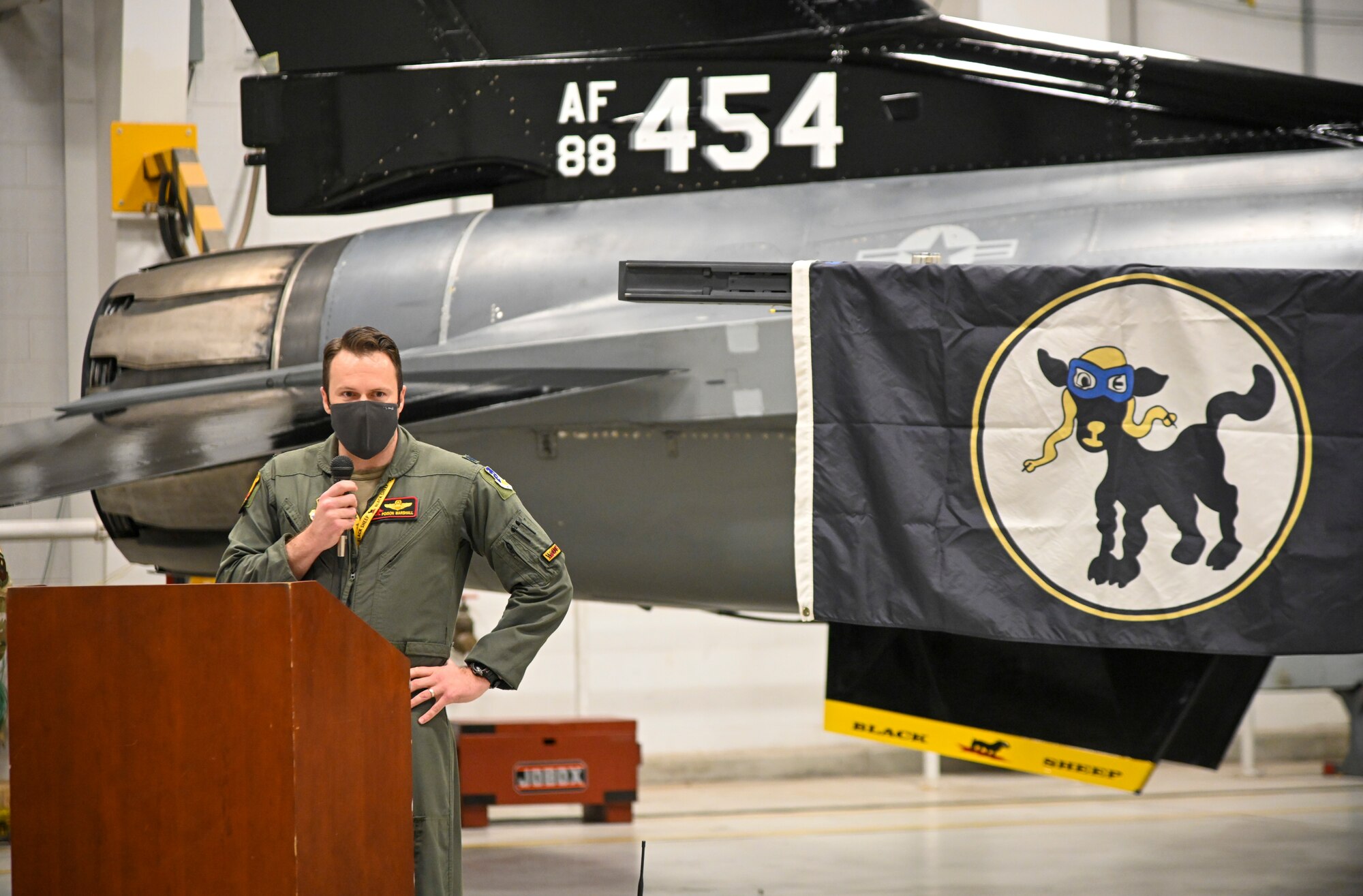 Lt. Col. Matthew Marshall, 8th Fighter Squadron director of operations, gives opening remarks during the 8th Aircraft Maintenance Unit transition ceremony, Dec. 22, 2021, on Holloman Air Force Base, New Mexico. The transition of the 8th AMU from civilian contractors to active duty Airmen increases the size of the 849th Aircraft Maintenance Squadron by 28 F-16 Vipers and over 200 personnel. (U.S. Air Force photo by Airman 1st Class Jessica Sanchez-Chen)