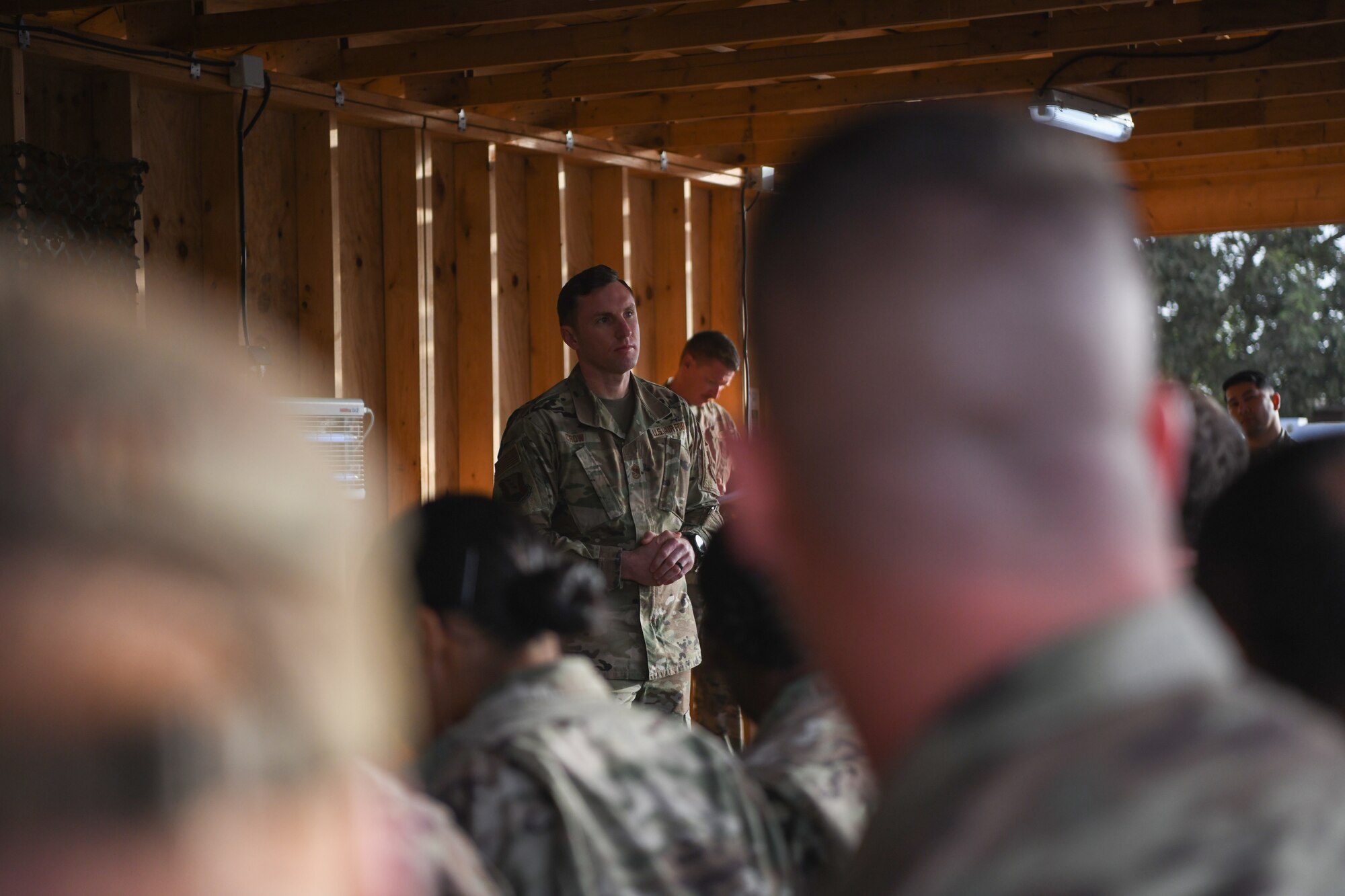 Chief Master Sgt. Corey Crow, 435th Air Ground Operations Wing and 435th Air Expeditionary Wing command chief, speaks at an-all-call at Nigerien Air Base 101, Niamey, Dec. 22, 202. The 435th AEW is the first and only air wing in Africa which provides secure, reliable, flexible expeditionary air power for combatant commanders. (U.S. Air Force
photo by Senior Airman Ericka A. Woolever)