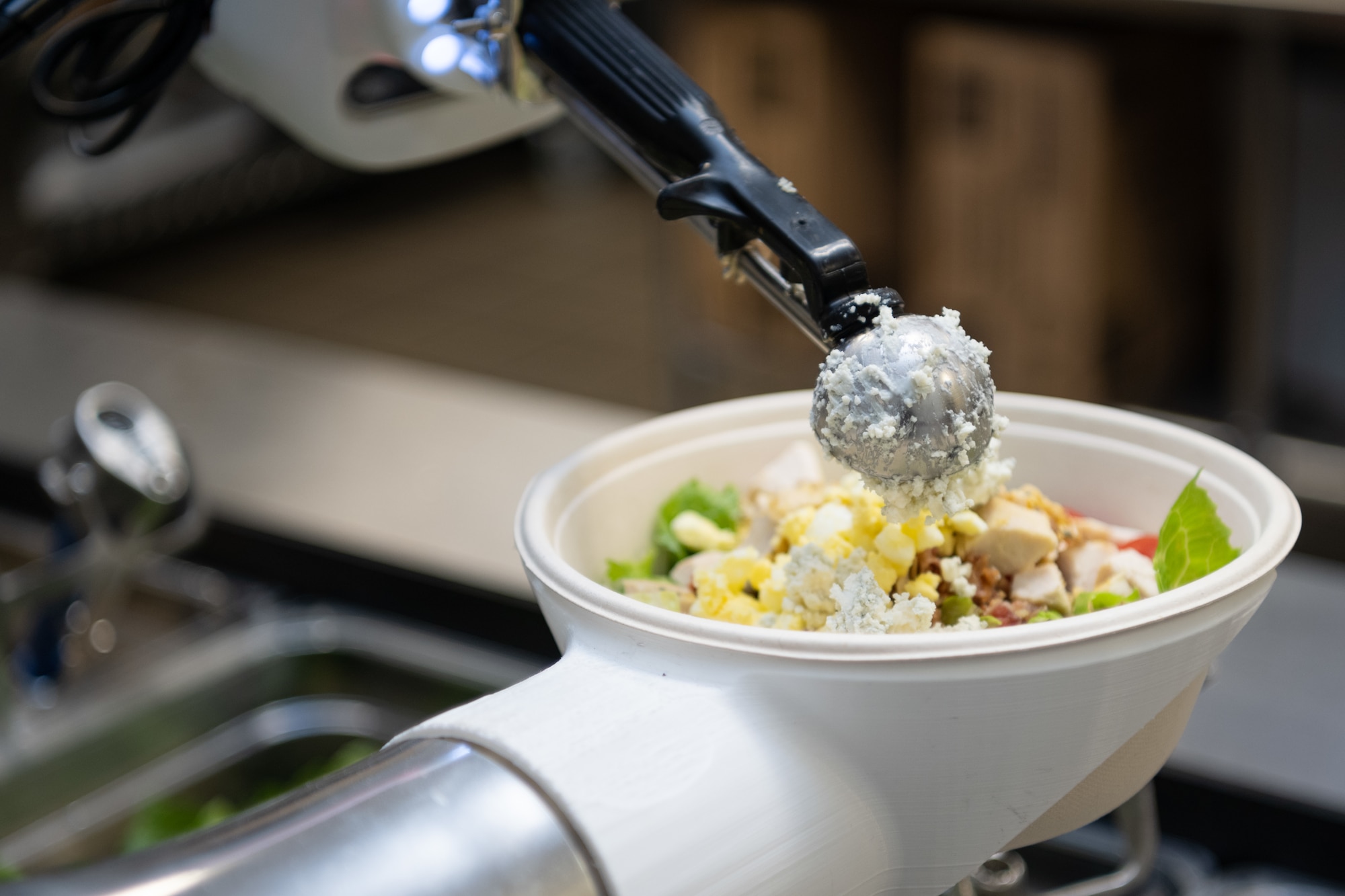 a food robot preparing food