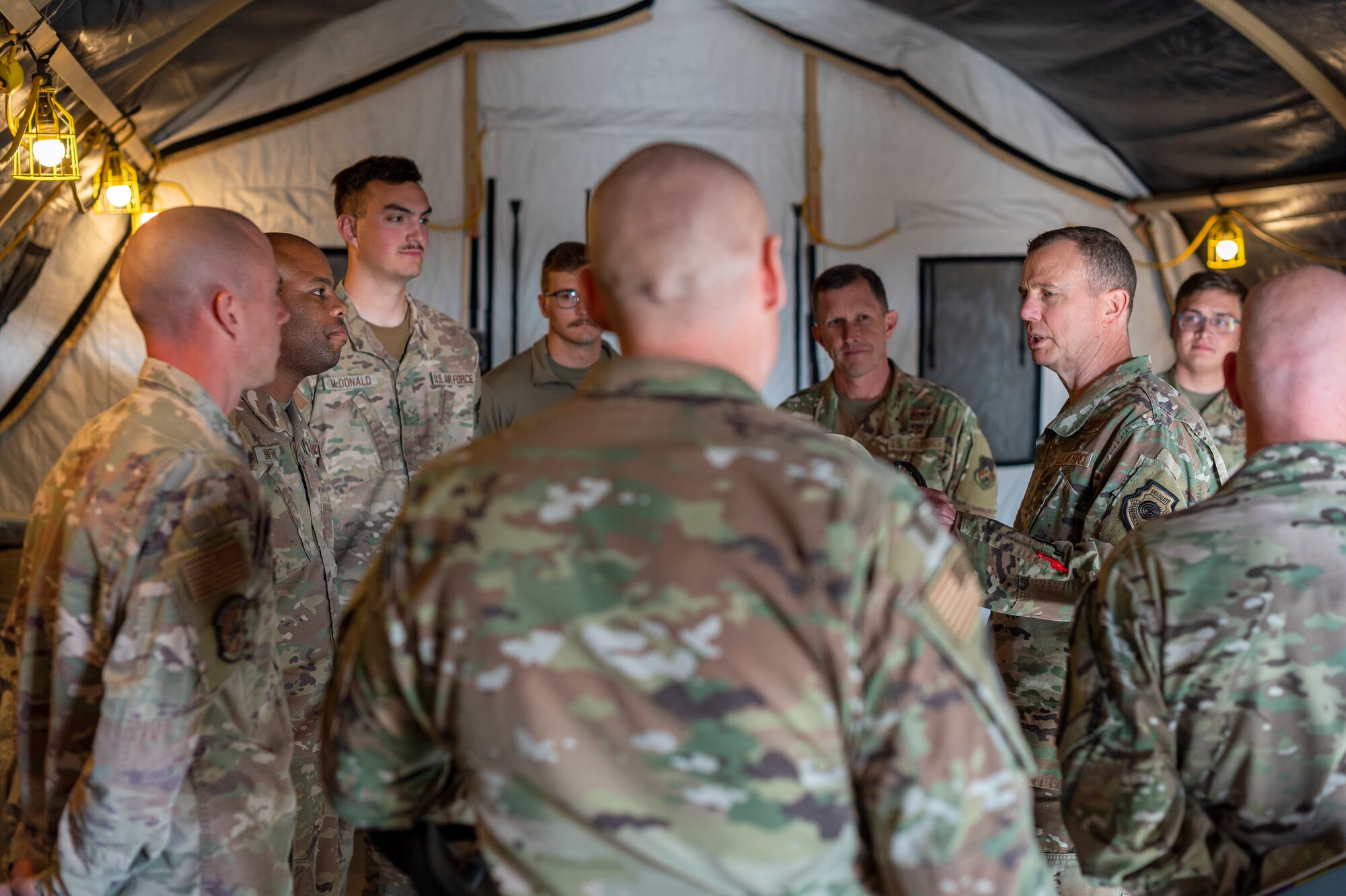 U.S. Air Force Lt. Gen. Gregory Guillot visited to speak with leadership and recognize superior performers.