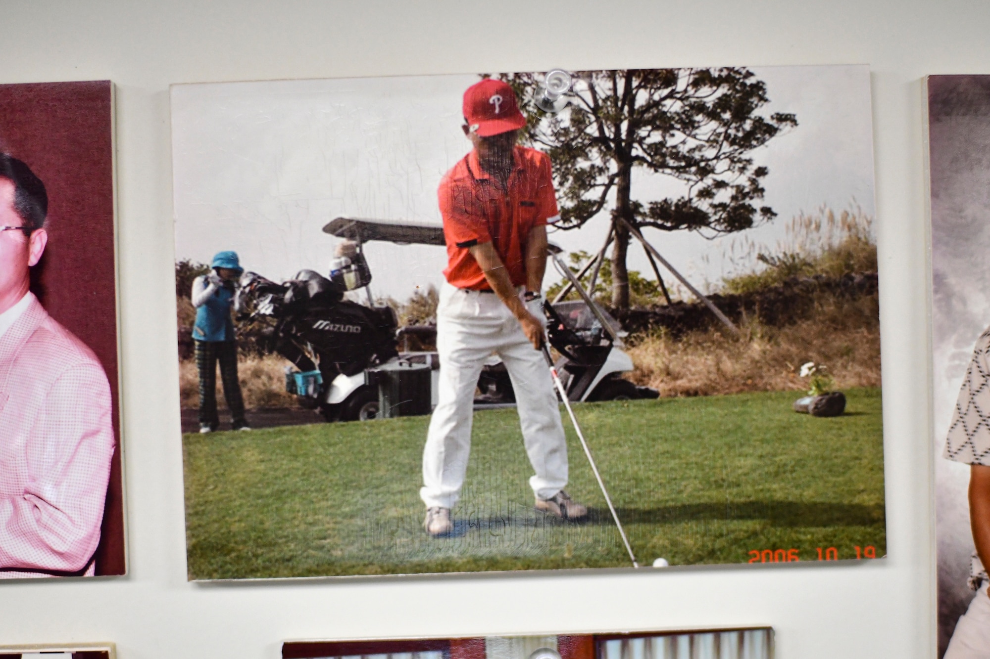 A graphics technician plays golf.