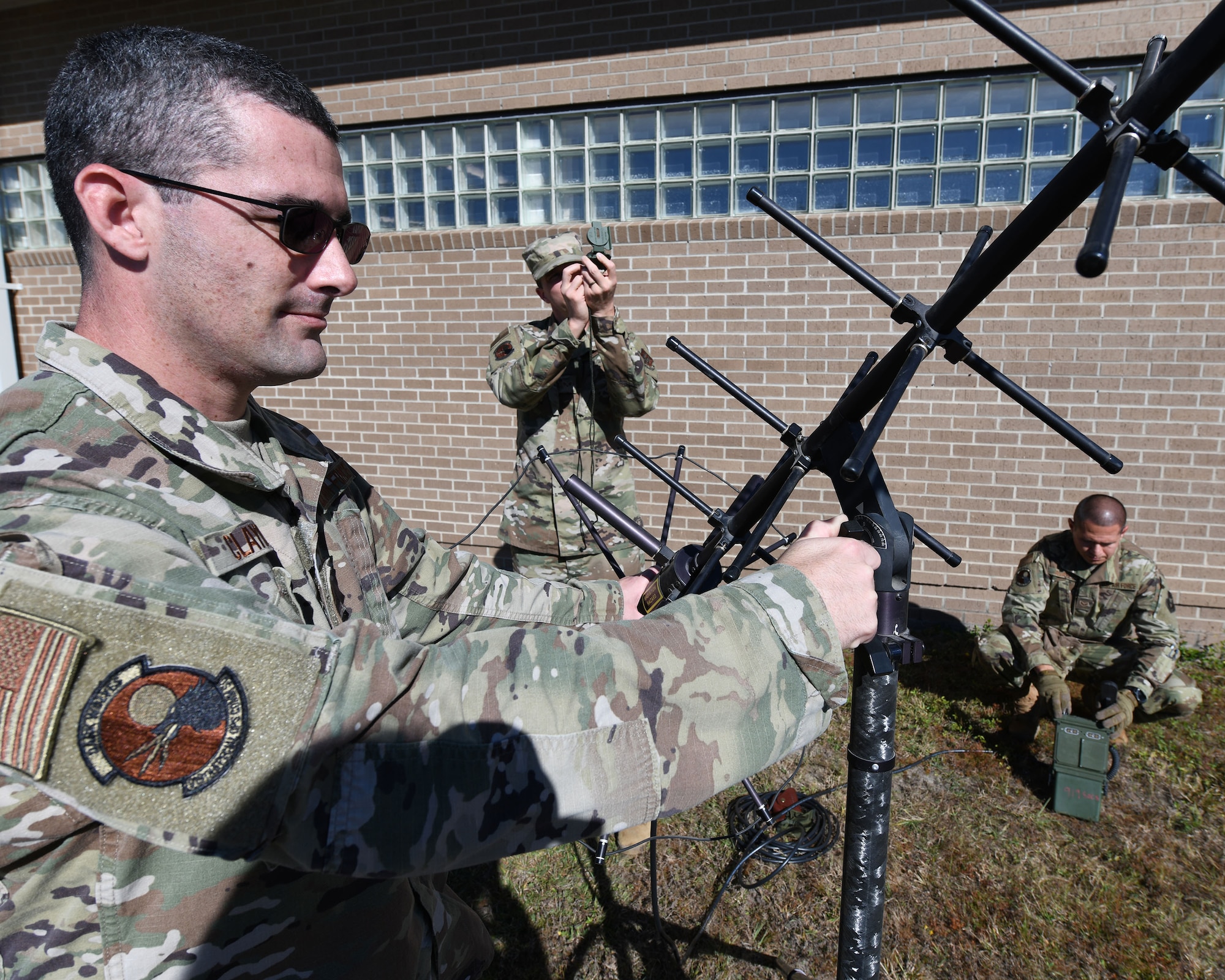 Cyber commandos set-up and align the angle of an antenna to a satellite