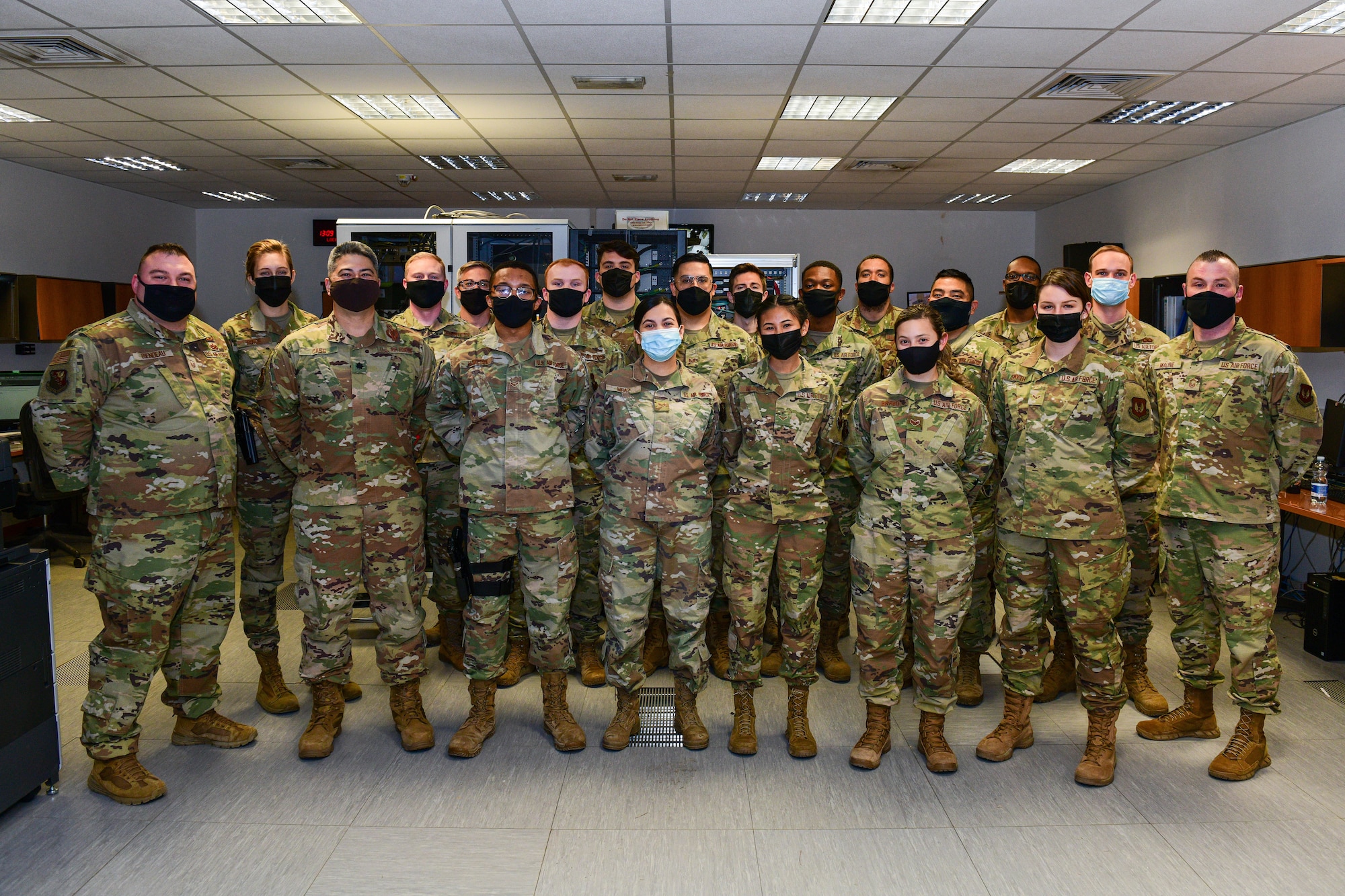 Members from the 31st Fighter Wing Command Post pose for a photo at Aviano Air Base, Italy, Dec. 16, 2021. The 31st FW CP was recognized as U.S. Air Forces in Europe Air Forces in Africa (USAFE-AFA) Large Nuclear Command Post of the Year for 2021. Furthermore, Master Sgt. Melvyn Thompson received the USAFE-AFA Unit Level Command and Control Operations Senior non-commissioned officer of the Year for 2021. (U.S. Air Force photo by Senior Airman Brooke Moeder)