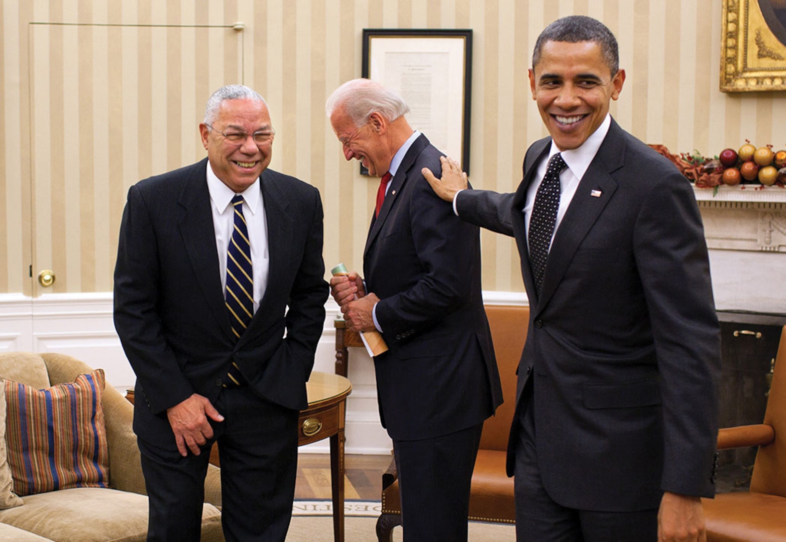 President Barack Obama jokes with Vice President Joe Biden and former Secretary of State Powell following their meeting in Oval Office, December 1, 2010 (The White House/Pete Souza)
