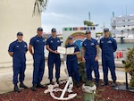 Petty Officer 1st Class Melissa Lopez del Castillo stands with her crewmembers at Station Miami Beach, Fla. Photo courtesy Petty Officer 1st Class Melissa Lopez del Castillo.