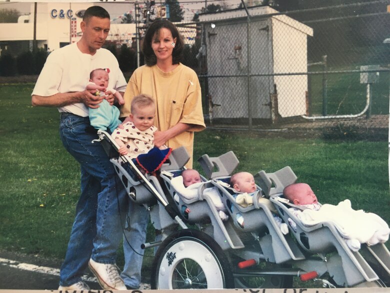 The family of Retired Marine Corps Brigadier Gen. Frank Kelley poses for a picture walking through the neighborhood streets with their five children and one on the way. They had their challenges associated with the sudden increase in size and military demands but overcame all obstacles together as a family. (Courtesy Photo)