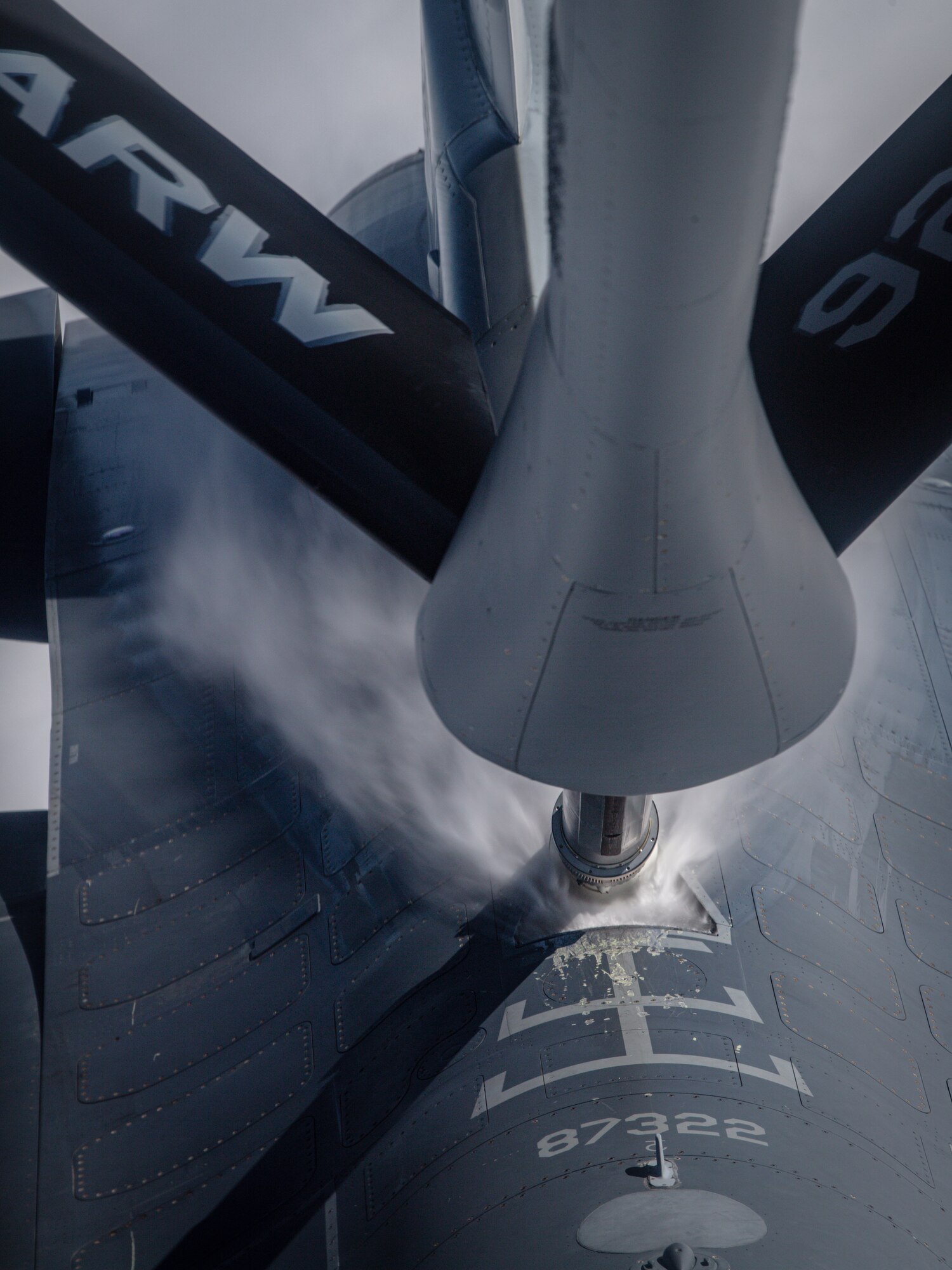 A KC-135 Stratotanker aircraft assigned to MacDill Air Force Base refuels an F-16 Fighting Falcon aircraft assigned to the 187th Fighter Wing, Alabama National Guard, during an exercise over Alabama, Dec. 21, 2021.