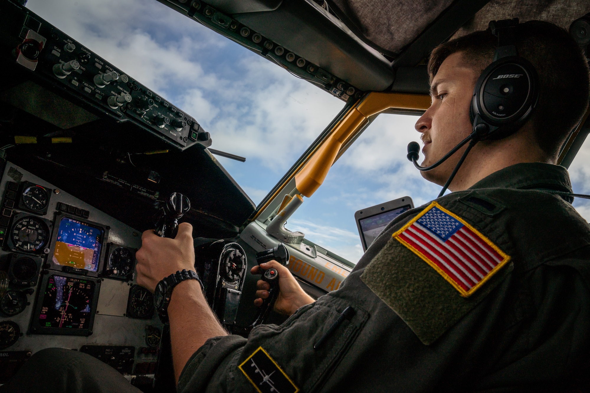 U.S. Air Force 1st Lt. Justin Casey, 91st Air Refueling Squadron pilot, flies a KC-135 Stratotanker aircraft during a refueling exercise over Alabama, Dec. 21, 2021.
