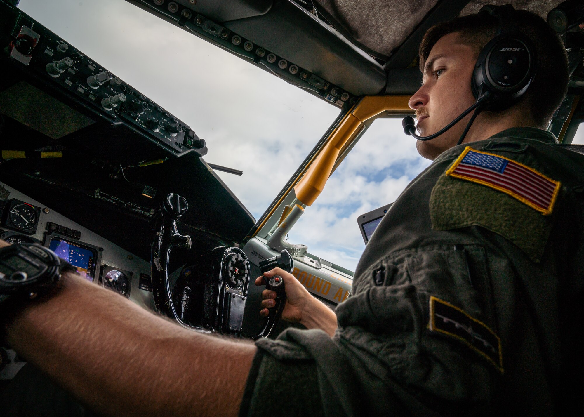 U.S. Air Force 1st Lt. Justin Casey, 91st Air Refueling Squadron pilot, flies a KC-135 Stratotanker aircraft during a refueling exercise over Alabama, Dec. 21, 2021.