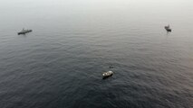 Coastal patrol ship USS Tempest (PC 2) and USS Typhoon (PC 5) interdict a stateless dhow carrying illicit drugs while transiting international waters in the Arabian Sea, Dec. 27. (U.S. Navy photo)