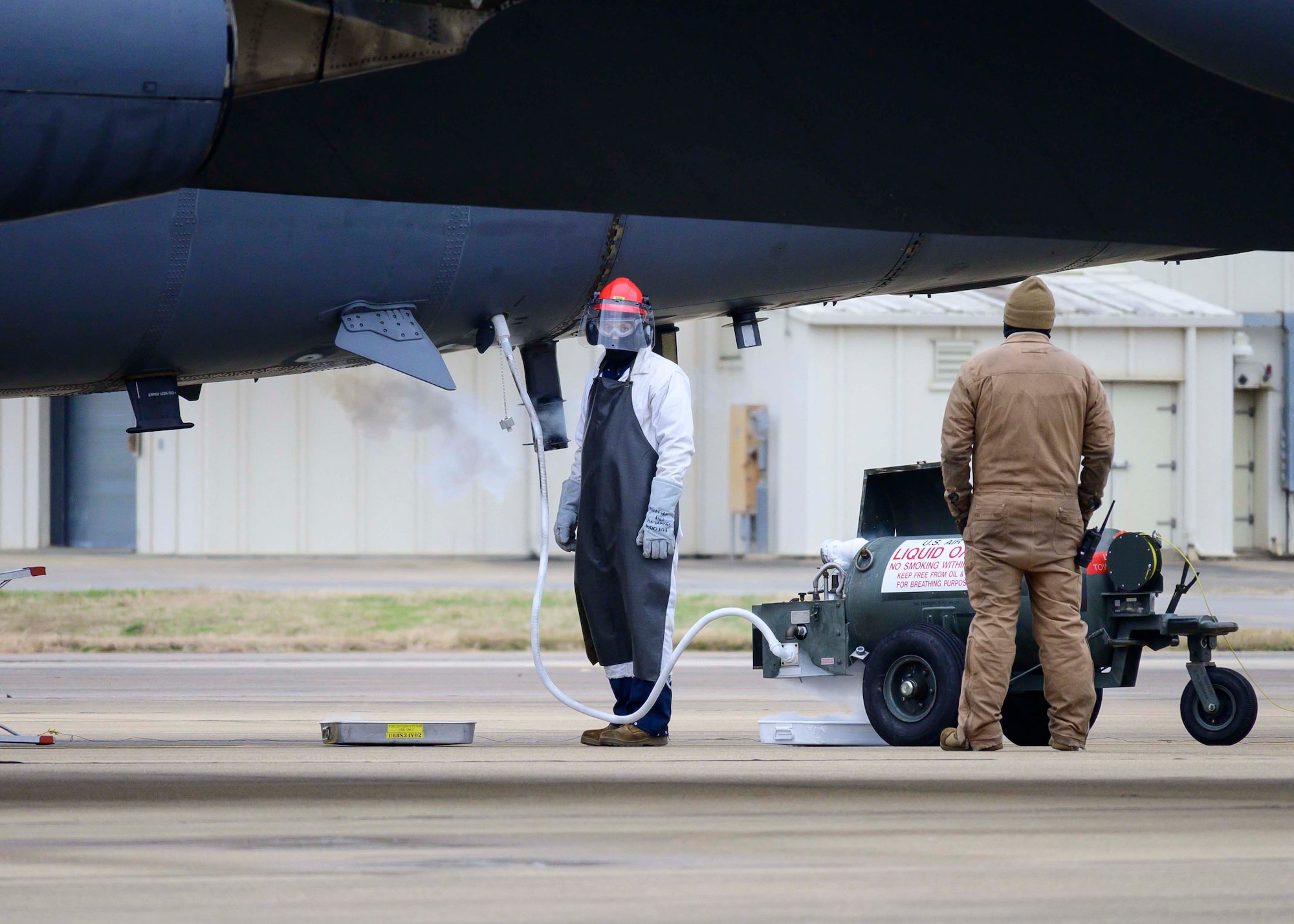 Airmen work on a B-52.