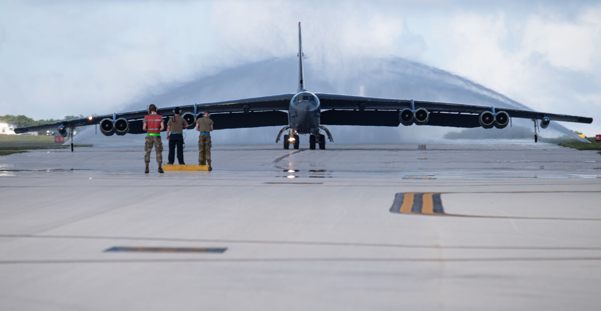 A B-52 taxis on a runway.