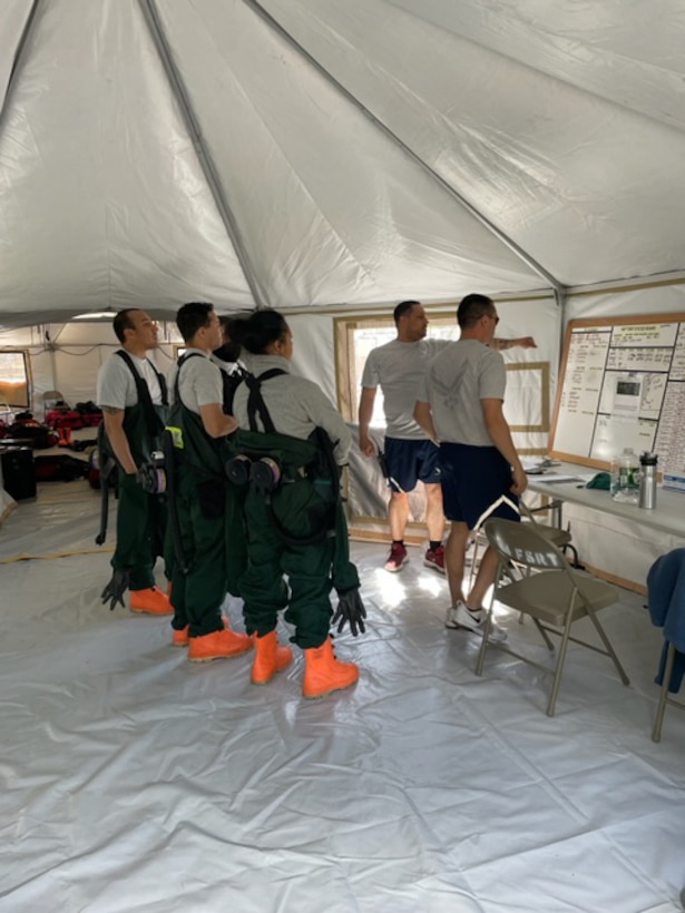 Members of the 104th Force Support Squadron fatality search and recovery team perform training during an exercise May 2021, at Barnes Air National Guard Base, Massachusetts. The FSRT trains to respond to various Chemical, Biological, Radiological, Nuclear, or non-CBRN incidents. (U.S. Air National Guard courtesy photos)