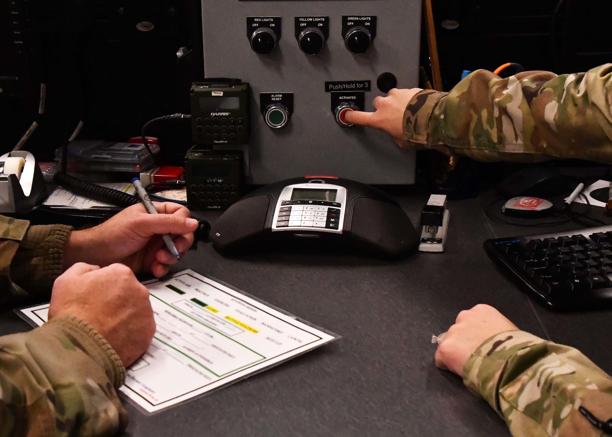 Airmen from the 104th Fighter Wing command post execute mission requirements December 3, 2021, at Barnes Air National Guard Base, Massachusetts. The command post is responsible for receiving and dispersing all information coming onto or leaving Barnes ANGB.  (U.S. Air National Guard photo by Staff Sgt. Sara Kolinski)