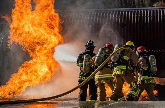 firefighters fight fire