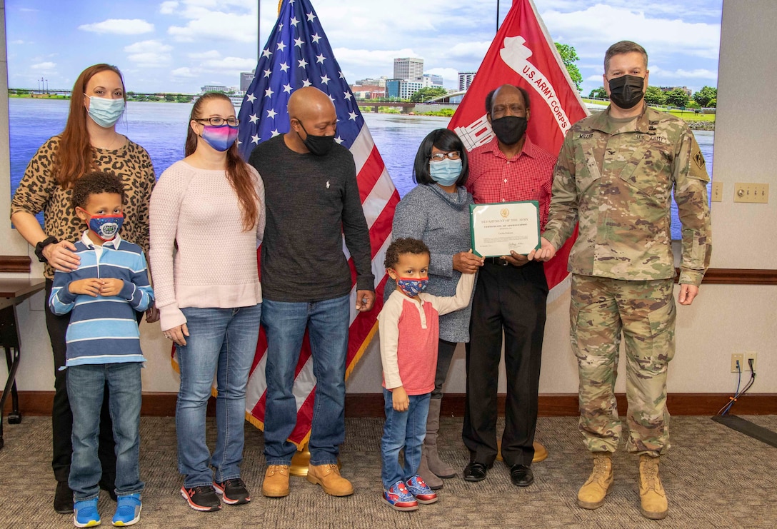 Structural Engineer Phillip Pinkston celebrates his retirement from the U.S. Army Corps of Engineers after an impressive 48 years of federal service. During his retirement ceremony, Memphis District Commander Col. Zachary Miller presented Pinkston with a Civilian Service Commendation Medal, Certificate of Retirement, and a special Certificate of Thanks. Pinkston spent two years with the Army Depot in Lexington before moving to Memphis, Tennessee, to work for the U.S. Army Corps of Engineers. Throughout the next 46 years, Pinkston would hold the positions of civil engineering technician, engineering draftsman, and finally, structural engineer. His more memorable project is his first, which was developing a repair design for a levee slide at the Huxtable Pumping Station. Congratulations again on your retirement, Mr. Phillip Pinkston, and many thanks for your dedicated service to the Memphis District, the Mississippi Valley Division, and the U.S. Army Corps of Engineers. (USACE photos by Vance Harris)