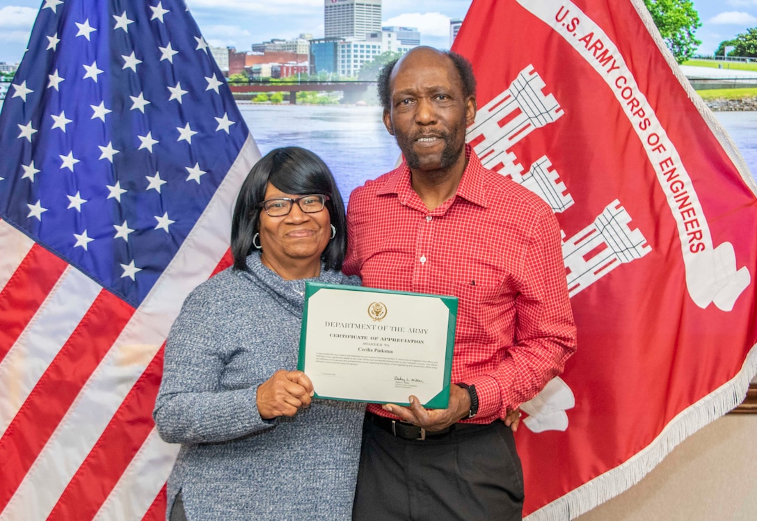 Structural Engineer Phillip Pinkston celebrates his retirement from the U.S. Army Corps of Engineers after an impressive 48 years of federal service. During his retirement ceremony, Memphis District Commander Col. Zachary Miller presented Pinkston with a Civilian Service Commendation Medal, Certificate of Retirement, and a special Certificate of Thanks. Pinkston spent two years with the Army Depot in Lexington before moving to Memphis, Tennessee, to work for the U.S. Army Corps of Engineers. Throughout the next 46 years, Pinkston would hold the positions of civil engineering technician, engineering draftsman, and finally, structural engineer. His more memorable project is his first, which was developing a repair design for a levee slide at the Huxtable Pumping Station. Congratulations again on your retirement, Mr. Phillip Pinkston, and many thanks for your dedicated service to the Memphis District, the Mississippi Valley Division, and the U.S. Army Corps of Engineers. (USACE photos by Vance Harris)