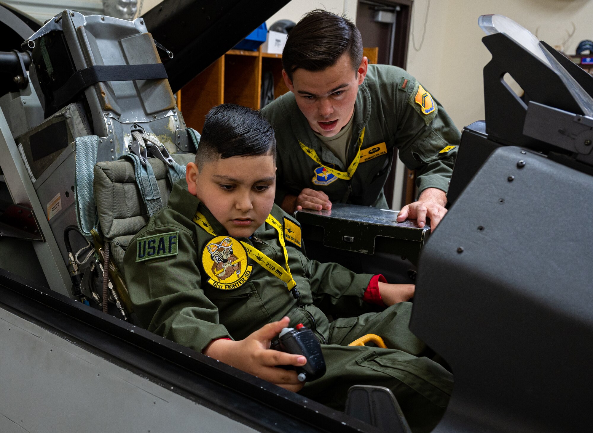 Anthony ‘Baby Yoda’ Ramos, Pilot for a Day participant, sits in an F-16 Fighting Falcon training cockpit Dec 16, 2021, at Luke Air Force Base, Arizona.