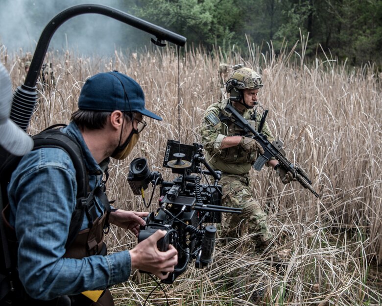 A member of the Kentucky Air National Guard’s 123rd Special Tactics Squadron is filmed by members of GSD&M, a marketing and advertising company, at FRP LaGrange Quarry, in La Grange, Ky., on April 14, 2021. The production shoot is part of a national ad campaign funded by the National Guard Bureau to advertise the Air National Guard. (U.S. Air National Guard photo by Tech. Sgt. Joshua Horton)