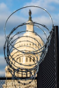 Concertina wire lines the top of a perimeter fence outside an entry control point near the U.S. Capitol building in Washington, D.C., Jan. 19, 2021.