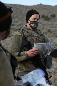 Soldier holds papers