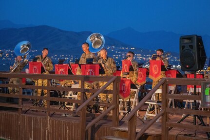 Army band sits and performs